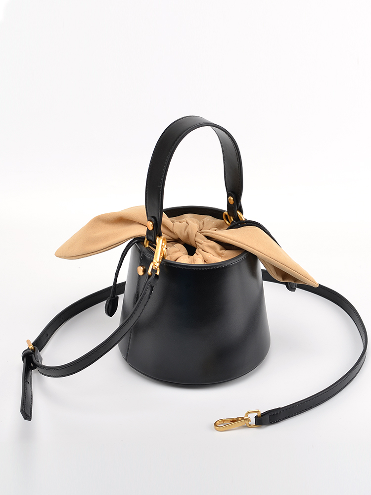آذان أرنب تنوعا دلو حقيبة جلد  - مراجعة Luxury Bags Without Logo وسعره