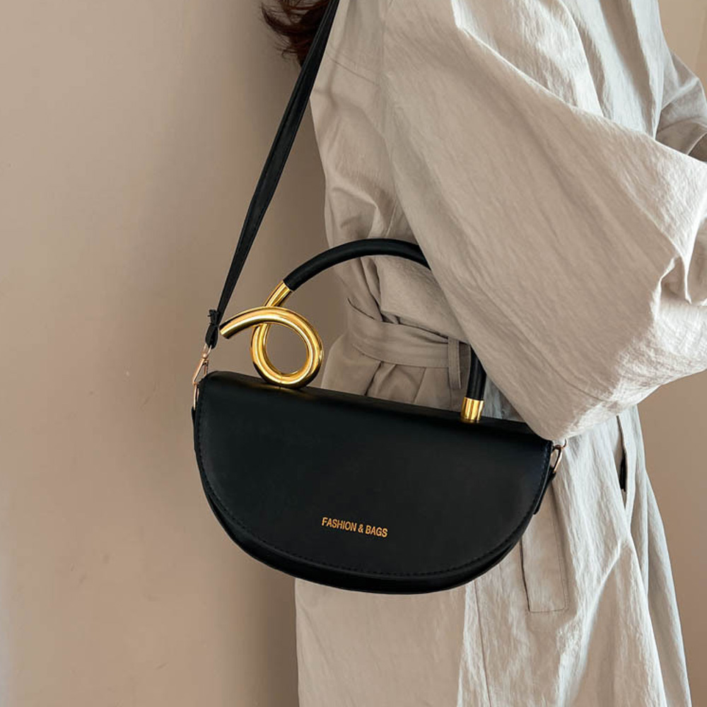 حقيبة كروس بودي بتصميم سرج مع  - مراجعة Luxury Bags Without Logo وسعره